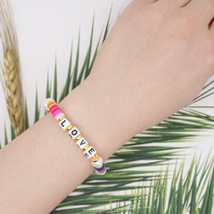 einfaches perlmuttfarbenes handgewebtes LOVE-Buchstaben-Farbweichkeramik-Armband
