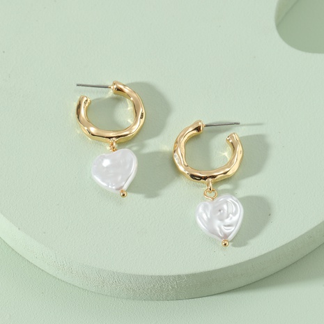 European and American fashion jewelry metal heart pearl earrings NHLU629982's discount tags