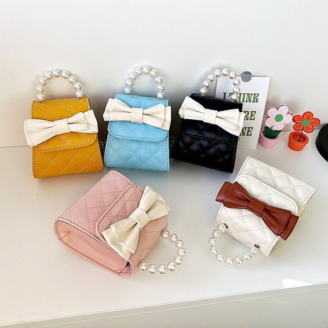 Children's bag pearl bag contrast color bow new cute mini handbag 13*12*7cm's discount tags