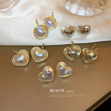 Fashion Pearl Heart Shaped Alloy Earrings Wholesale's discount tags