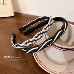 modisches, handgewebtes Twist-Lederstirnband, schwarz-weißes Stirnband in Kontrastfarbe
