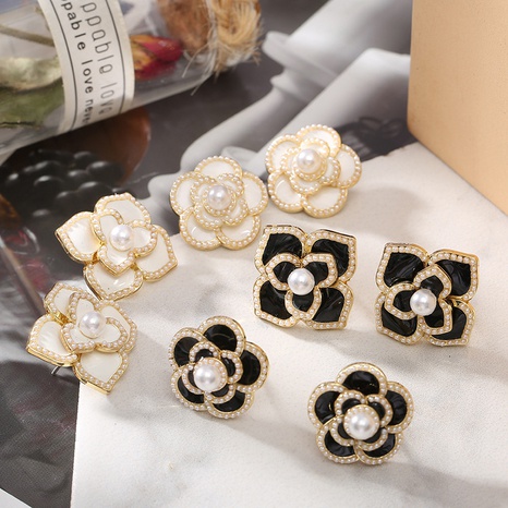 Japan and South Korea new camellia simple retro alloy earrings wholesale NHSHU638149's discount tags