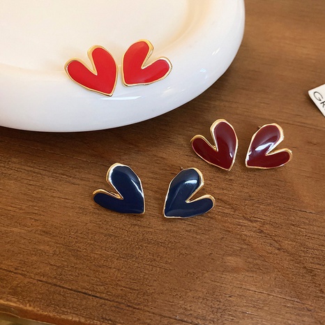 fashion contrast color dripping oil heart alloy earrings wholesale NHJBY630327's discount tags