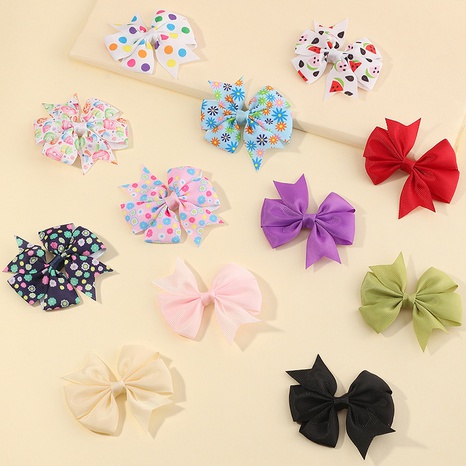 Korean simple new polka dots solid color fruit bow children's hairpin duckbill clip's discount tags