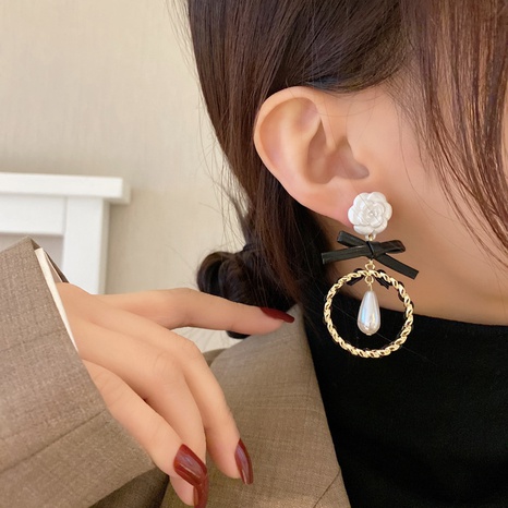 French flower earrings retro pearl earrings simple alloy earrings wholesale  NHBY642952's discount tags