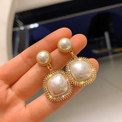 simple half-faced large pearl like broken diamond alloy earrings