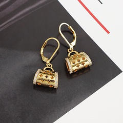 Light luxury earrings female niche hollow 18k gold bag copperear buckle
