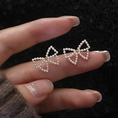 Korean simple small pearl bow alloy stud earrings