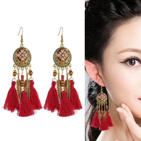 vintage long tassel rice bead round carved oil painting earrings's discount tags