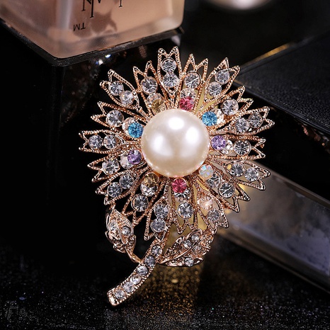 Broche de aleación de flor de sol de cristal de perla de diamante de moda's discount tags