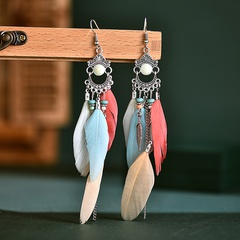Boucles d'oreilles en perles de riz à plumes assorties à pompon rétro de couleur longue en gros