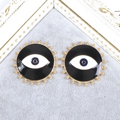 vintage contrast color alloy oil dripping devil's eye earrings wholesale