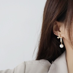 fashion inlaid rhinestone bow shaped pearl metal drop earrings wholesale