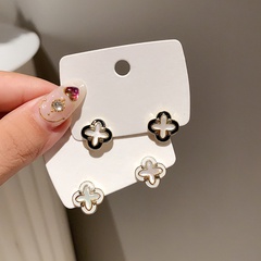 simple four flower inlaid zircon alloy stud earrings wholesale