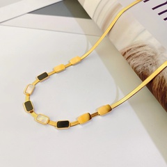 neue schlangenknochenkette aus titanstahl mit 18 karat vergoldeter schwarz-weißer quadratischer halskette