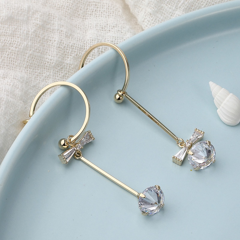 Simple fashion cshaped copper zircon bows asymmetrical earrings