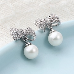 Fashion Classic Copper Inlaid Zircon Bow Pearl Stud Earrings