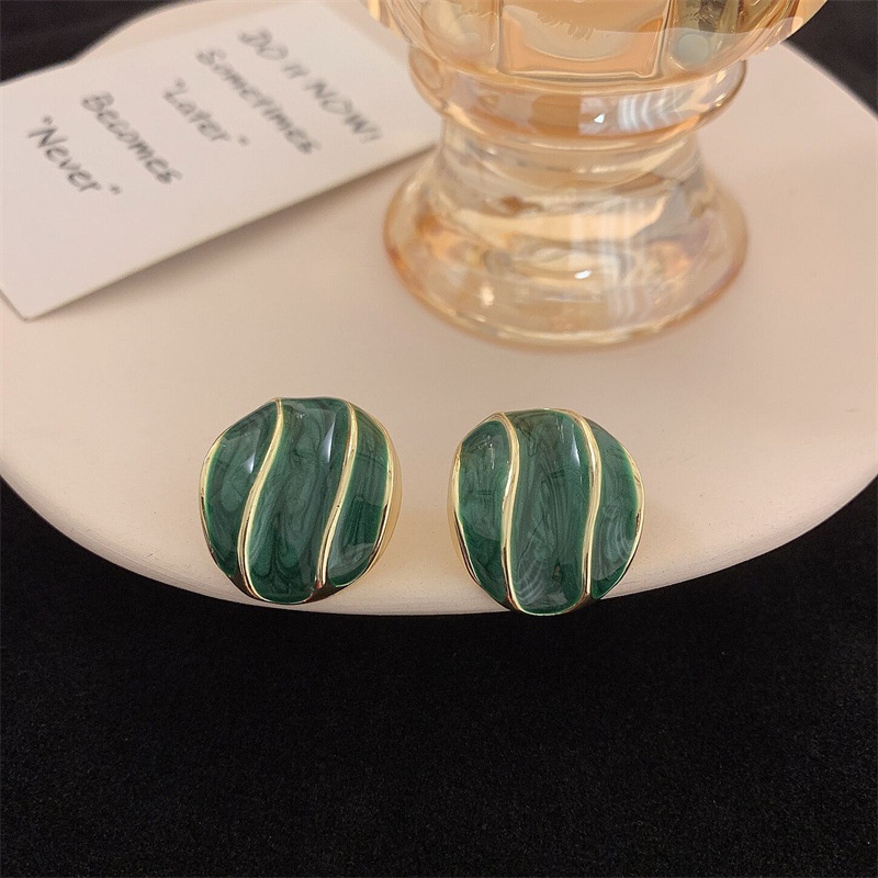 Fashion autumn and winter new green geometric irregular retro oval alloy  earrings