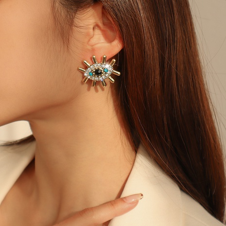 simple fashion devil's eye alloy diamond retro stud earrings NHMD654208's discount tags