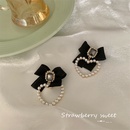 Korean autumn and winter new heart pearl retro bow alloy earringspicture6