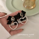 Korean autumn and winter new heart pearl retro bow alloy earringspicture7