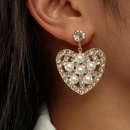 fashion hollow heart shaped inlaid pearl diamond metal drop earringspicture7