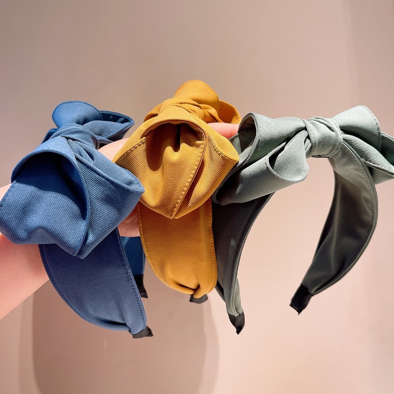 retro solid color threedimensional big flower bud bow hairpin headband wholesale