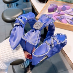fashion solid color purple inlaid rhinestone bow shaped headband wholesale