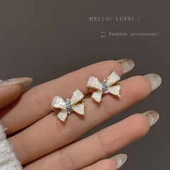 High-quality niche temperament unique bow stud earrings women's silver needle