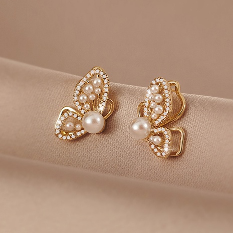 Pendientes de perlas de mariposa de nicho de lujo ligero de Corea del Sur nuevos pendientes de moda pendientes de temperamento exquisito de gama alta para mujer's discount tags