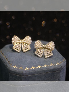 French light luxury high-end pearl bow temperament earrings female spring 2022 new fashion all-match earrings