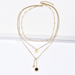 Titan Stahl vergoldet 14 Karat Gold Mode Persönlichkeit runde römische Ziffern schwarze Muschel dreilagige Halskette