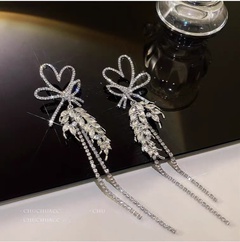 Fashion diamond bow wheat long tassel heart shaped alloy earrings