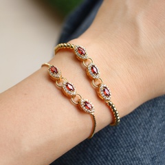 New female fashion micro-inlaid red zircon adjustable pull copper bracelet