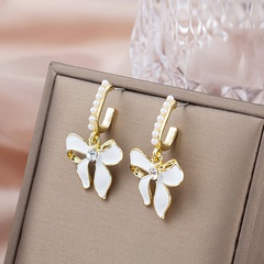 Fashion drop oil bow pearl sweet elegant alloy earrings