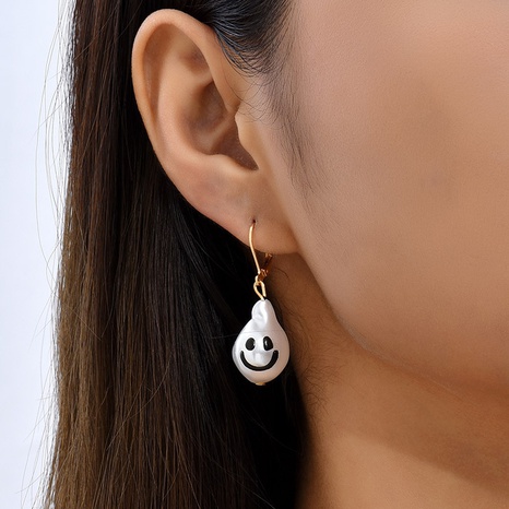 Bohemian simple cute pearl smiley resin earrings female's discount tags