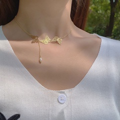 Nouveau collier en alliage d'imitation de perle avec pendentif à combinaison de trois papillons creux