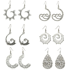 Fashion new creative spiral retro carved hollow alloy earrings