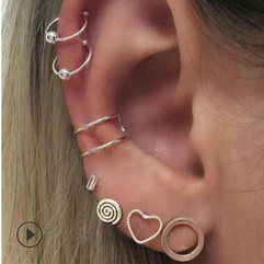 fashion bohemian heart spiral geometric stud earrings seven-piece set