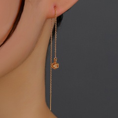 A pair of new hollow cage copper zircon pendant tassel pierced ear line earrings