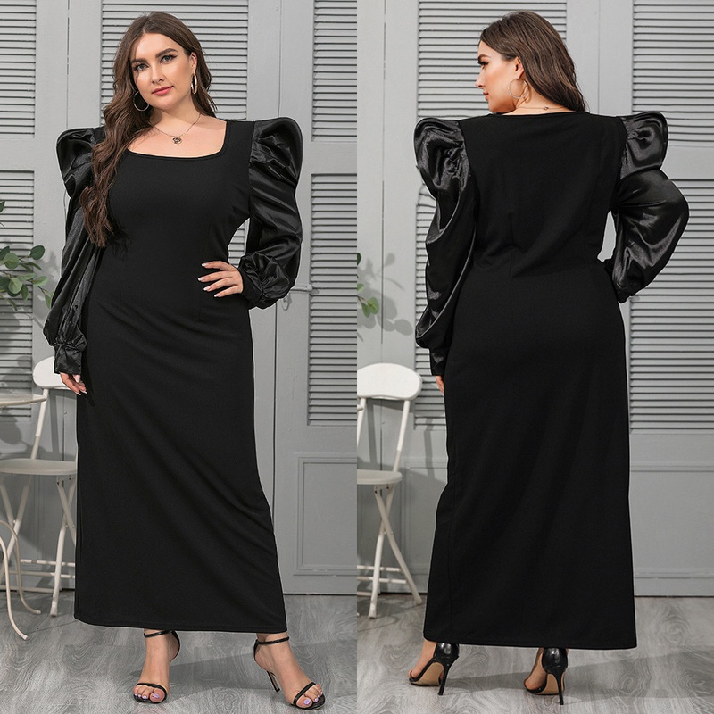 Groes Damenkleid mit schwarzem quadratischem Ausschnitt und Puffrmeln
