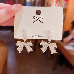 korean style white bow inlaid pearl alloy earrings wholesale