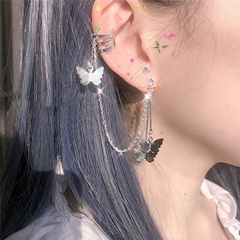 Clip d'oreille en alliage simple avec pompon papillon à la mode