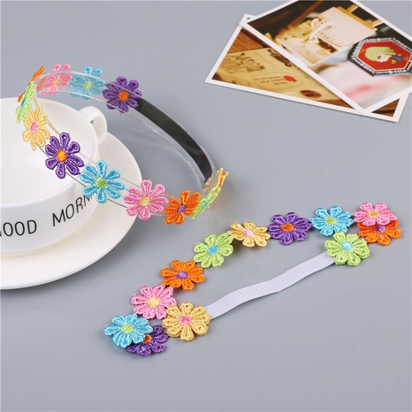New colorful petals children's hairband baby headwear's discount tags