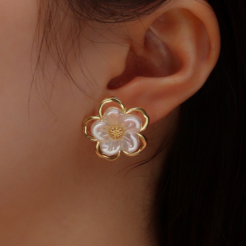fashion flower pearl simple hollow flower alloy stud earrings