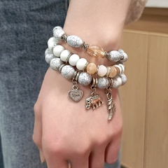 Mode grau Naturstein Perlen Kontrastfarbe Armband Set