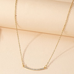 new diamond-studded curved pendant necklace