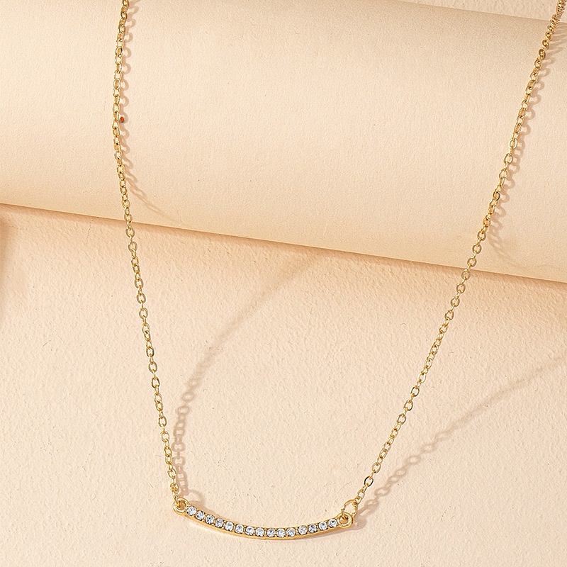 new diamondstudded curved pendant necklace