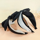 Korean doublelayer bow leather rabbit ear simple color matching headbandpicture6