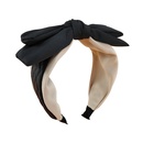 Korean doublelayer bow leather rabbit ear simple color matching headbandpicture8